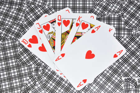 Hearts poker on a playing cards backgroundのeditorial素材