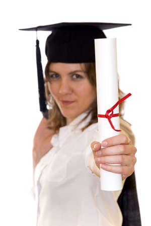 Young woman with graduation diploma and graduation hat isolated on white, diploma on a first scene, blurry women inn backgroundの写真素材