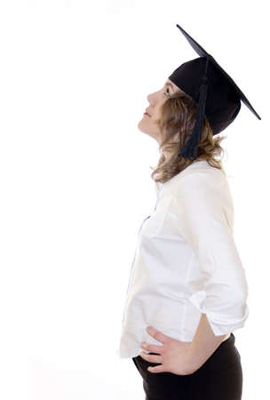 Profile of young women in student hat looking up, isolated on whiteの写真素材