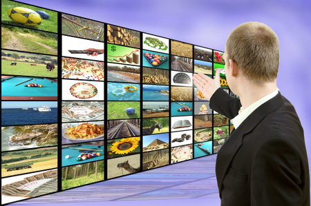 Businessman showing screen full of different images. Advertisment concept. all used images are my...