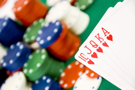Heart poker with lot of casino gambling chips in background