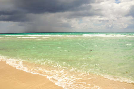 beautiful ocean beach in stromy weatcherの写真素材