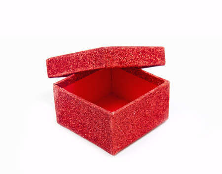 Shining red giftbox, isolated on whiteの写真素材