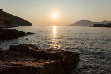 Sunset on the Adriatic Sea near PeljeÅ¡ac peninsula, Croatiaの写真素材