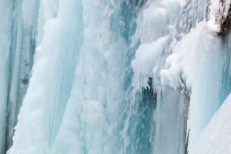 Frozen waterfalls during winter in Plitvice National Park, Croatiaの写真素材