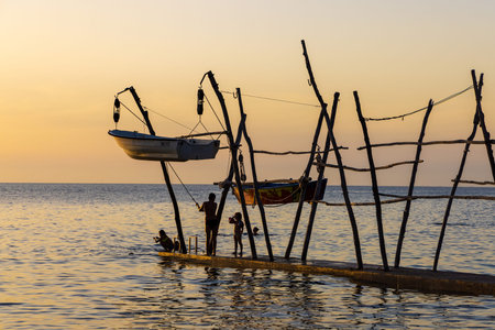 Hanging boats of Savudrija Boats hanging from traditional wooden cranesのeditorial素材