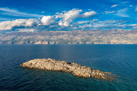 Small craggy islet Triget near Pag, Croatiaの写真素材