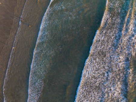 Ocean waves seen from above, Seminyak beach, Bali, Indonesiaのeditorial素材
