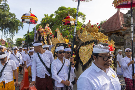 People in traditional clothes on the streets of Ubud, Baliのeditorial素材