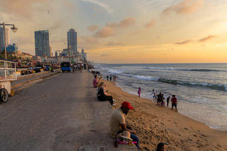 People enjoying the Colombo seafront at sunset, Sri Lankaのeditorial素材