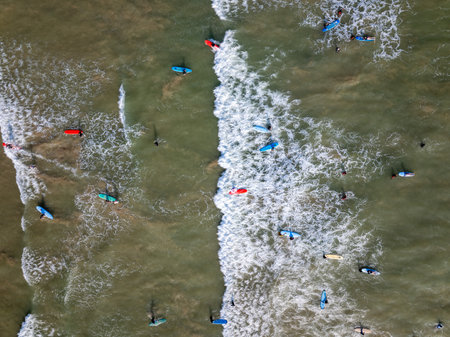 Aerial view of Weligama Beach with surfers riding the waves, Sri Lankaのeditorial素材