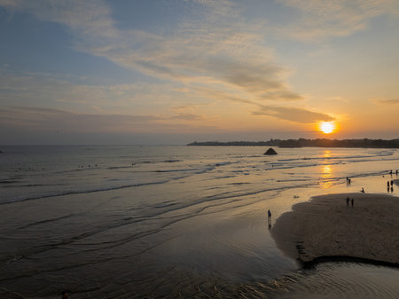Aerial view of Weligama Beach at sunset with surfers and evening light, Sri Lankaのeditorial素材