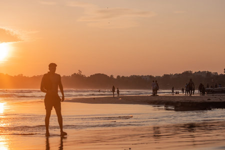Public town beach in Weligama at sunset, Sri Lankaのeditorial素材