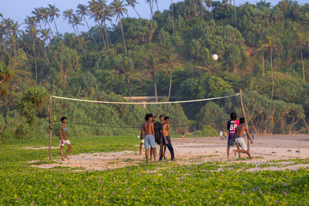 Local Boys Playing Beach Volleyball on Talalla Beach, Sri Lankaのeditorial素材