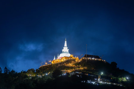 Mahamevnawa Buddhist Monastery on a Hilltop Near Ella, Sri Lanka, at Duskの写真素材