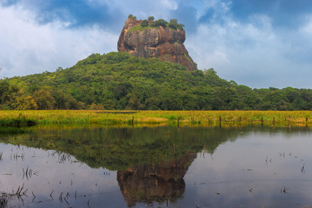 Sigiriya Lion Rock Reflected in a Lake, Sri Lankaのeditorial素材