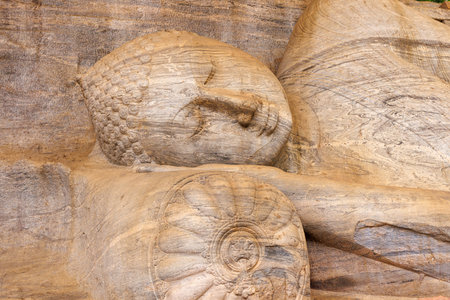 Reclining Buddha Statue Carved in Stone, Polonnaruwa, Sri Lankaのeditorial素材