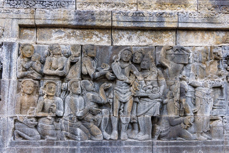 Stone Relief Carvings on Borobudur Temple, Ancient Buddhist Art in Indonesia