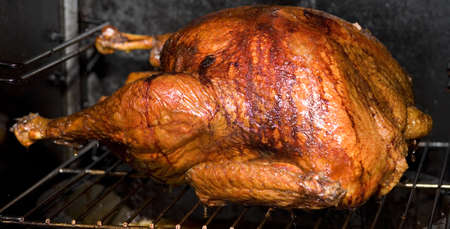 turkey that has been cooking in a smoker for six hoursの写真素材