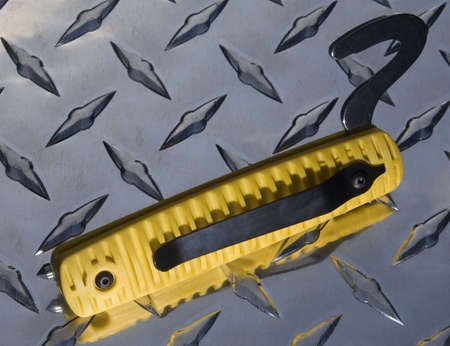 emergency crew tool for cutting seat belts and breaking windowsの写真素材