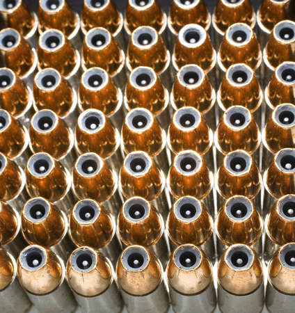 Hollow point bullets on ammunition that have a nail in their middleの写真素材