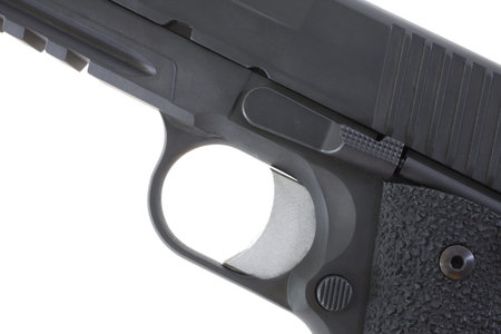 Solid trigger and trigger guard on a black handgun