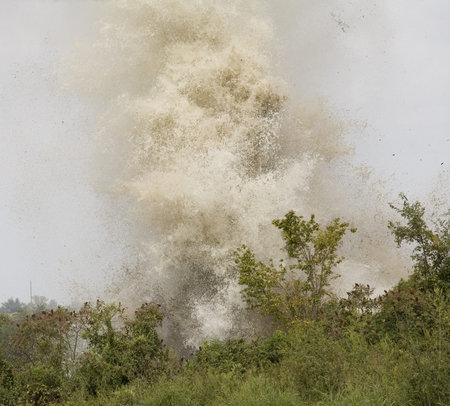 Explosion that has sprayed water above the treetops
