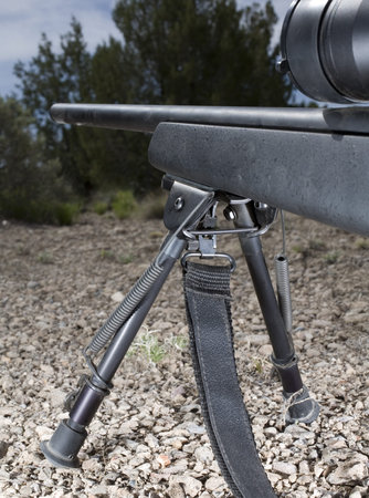 Rifle on a ridgeline that is stabilized on a bipod