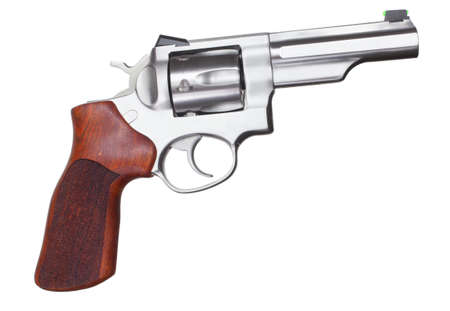 Stainless steel revolver with wood grips isolated on whiteの写真素材