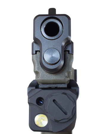 Laser and flashlight mounted to the bottom of a pistol