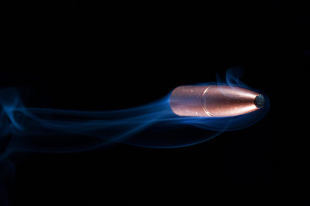 Copper coated bullet that looks like it is passing the camera