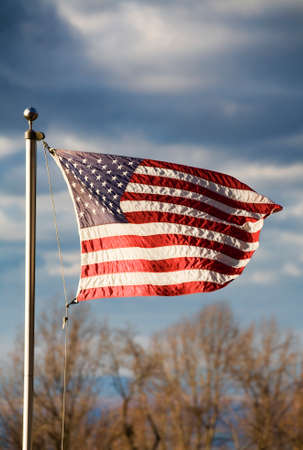 American flag flying high and proud over the Shenandoah Valleyの写真素材
