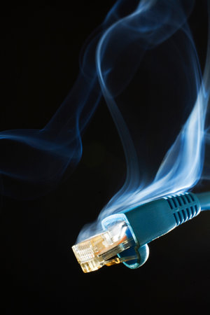 Computer network connection with smoke on a black background