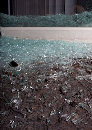 Glass shattered from a sliding glass door during a home invasionの写真素材