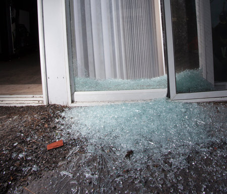 Sliding glass door in pieces after an attempted home invasion