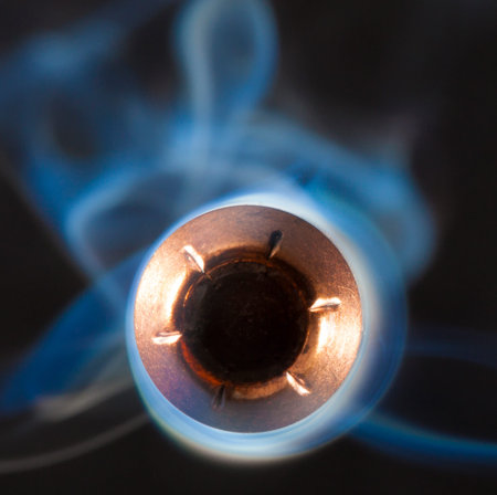 Bullet that appears to be coming at the camera with smoke behind