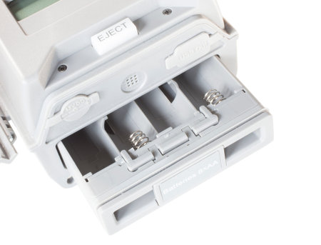 Tray that holds eight AA batteries on a security camera