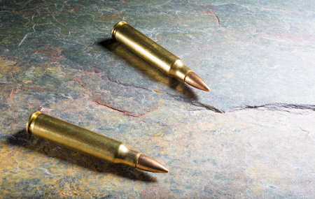 Cartridges for an assault rifle on a piece of slate