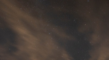 Stars with a few clouds at night at Lake Tillery in North Carolina