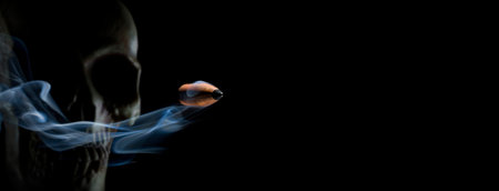 Copy space next to a skull and bullet with smoke behind