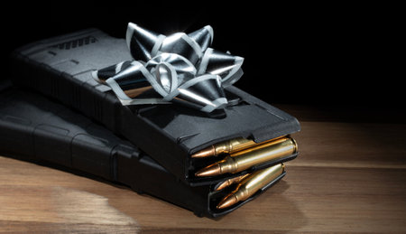 Silver and white bow on polymer assault rifle magazines that are loaded with ammunition.の写真素材