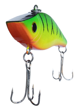 Orange, green and yellow artificial largemouth bass fishing lure with two treble hooks looking at the camera.の写真素材