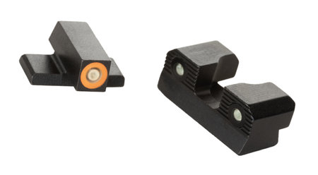 Sights with tritium inserts that glow in the dark to allow better aiming with a pistol at night.の写真素材