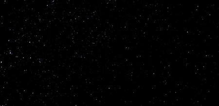 Bright starry sky on a dark night ideal for a background or texturesの写真素材