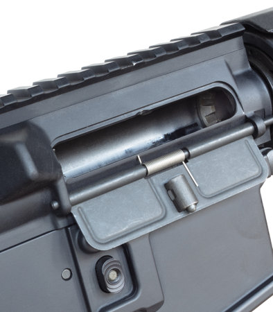 No cartridge in the chamber of an AR-15 that has its dustcover open to show the rifle is safe.の写真素材