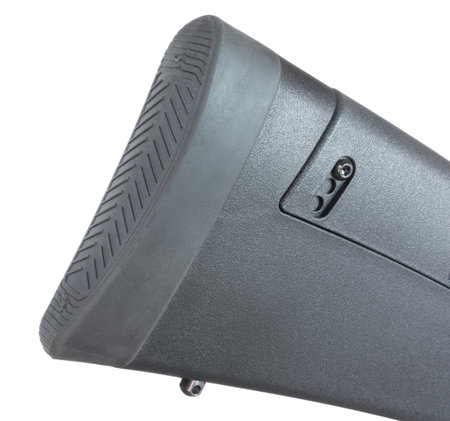 Textured recoil pad on a black stocked modern rifle to cushion the energy felt by a shooter with every shot.の写真素材