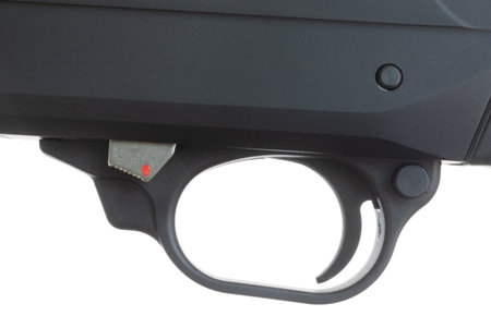 12-gauge shotgun trigger and trigger guard with the action release button and safety showing isolated on a white background.の写真素材