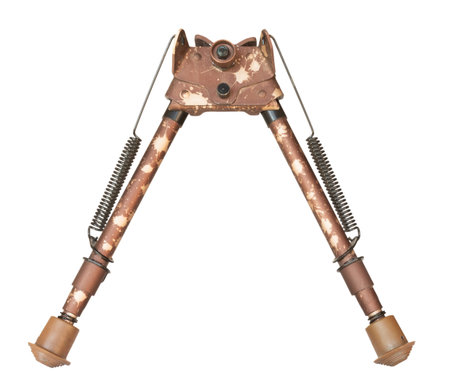 Brown, beige and yellow camouflage bipod for precision shooting seen from the front and isolated on...