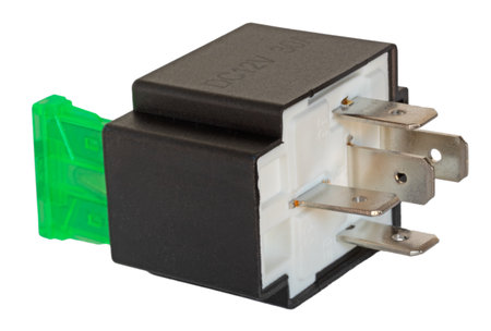 Large relay used on 12 volt systems that has a fuse as part of its circuit isolated on a white background.の写真素材