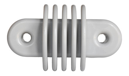 Plastic insulator often used as a standoff for a longwire antenna on two-way ham radio setups isolated on a white background.の写真素材